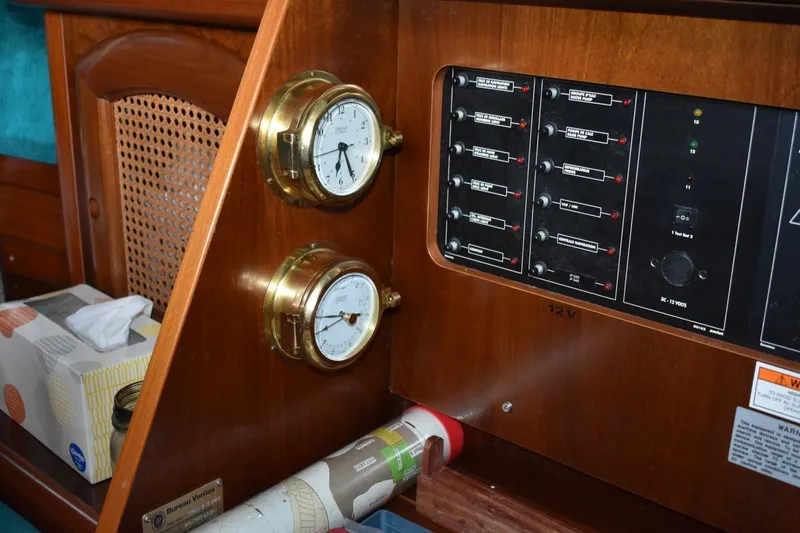 Slide: The Image of Control panel and gauges inside a 1999 Beneteau Oceanis 36 CC sailboat cabin. - 44