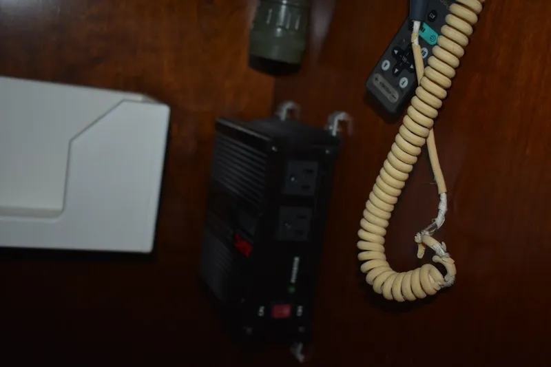 Slide: The Image of Electrical panel and coiled cable inside a 1999 Beneteau Oceanis 36 CC yacht. - 45