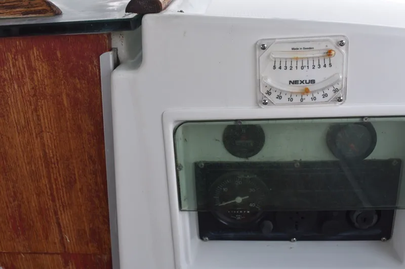 Slide: The Image of Instrument panel of a 1999 Beneteau Oceanis 36 CC sailboat with Nexus gauge. - 52