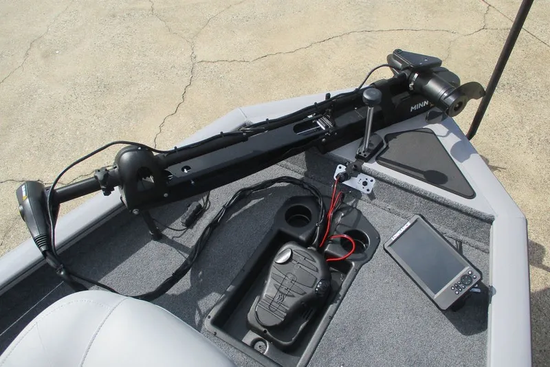 Slide: The Image of 2027 Tracker Pro Team 175 boat deck with trolling motor and electronic controls. - 11