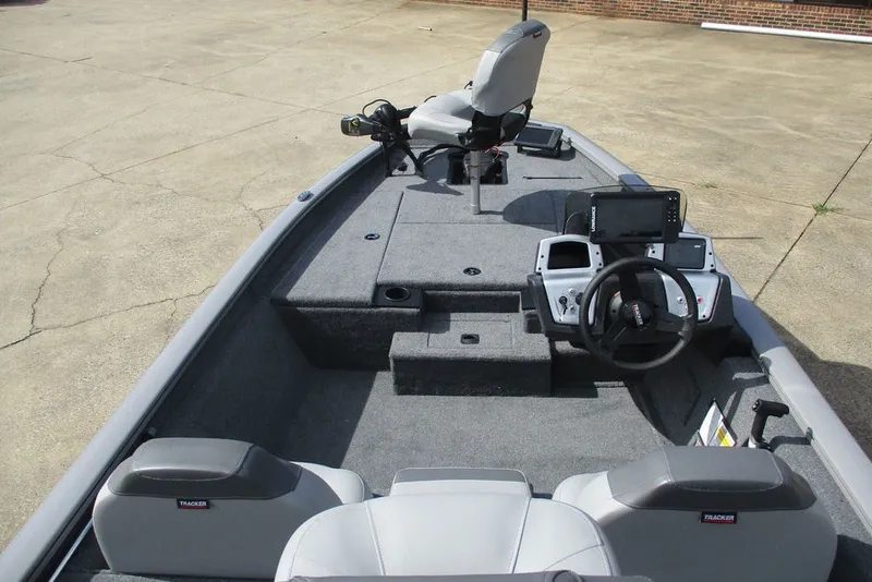 Slide: The Image of 2027 Tracker Pro Team 175 boat interior with steering console and seating. - 7