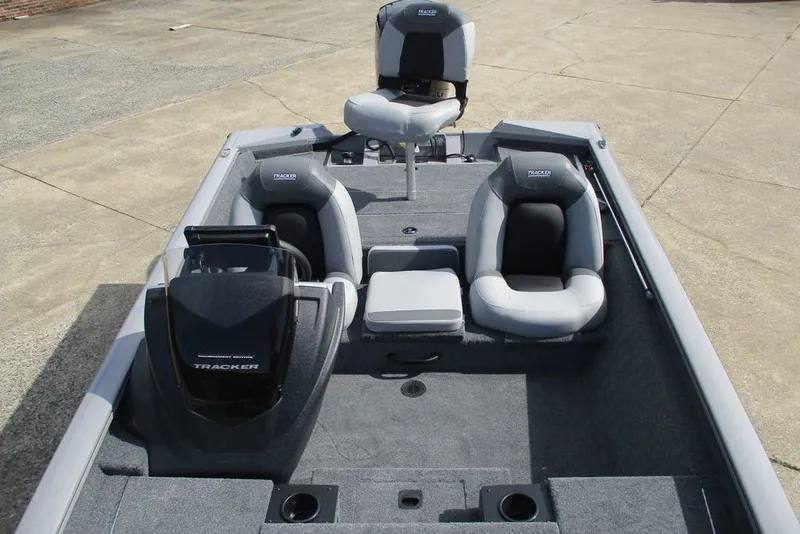 Slide: The Image of 2027 Tracker Pro Team 175 boat interior with seating and steering console. - 8