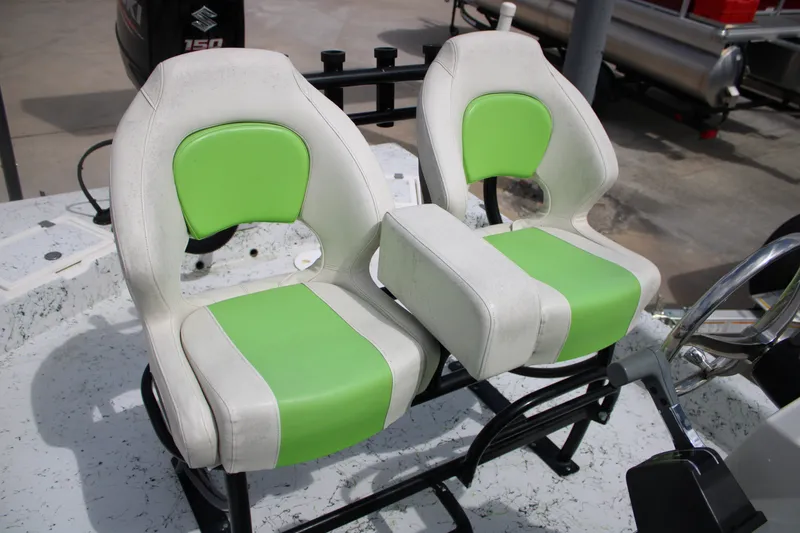 Slide: The Image of 2018 Shallow Stalker 204 RC boat seats with green and white upholstery. - 11