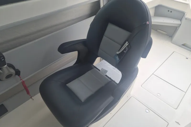 Slide: The Image of Captain's chair on 2027 Arima Sea Ranger 21 Yellowtail Edition boat. - 19