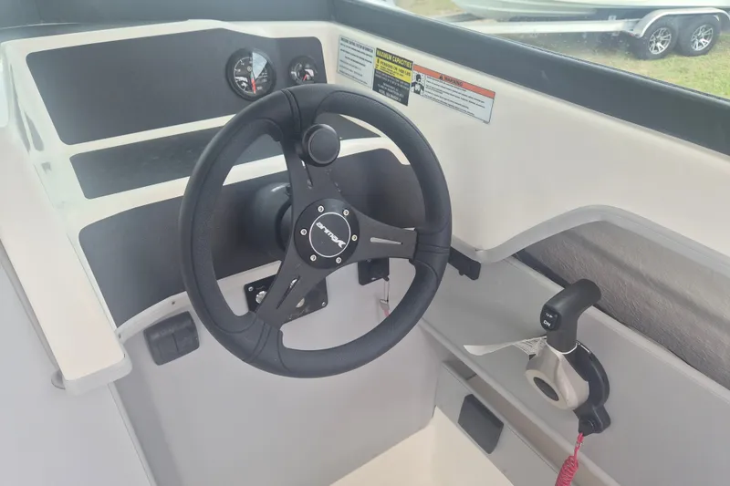 Slide: The Image of Steering wheel and controls of 2027 Arima Sea Ranger 21 Yellowtail Edition boat. - 20