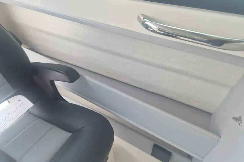 Slide: The Image of Interior of 2027 Arima Sea Ranger 21 Yellowtail Edition, featuring sleek seating and modern design. - 18
