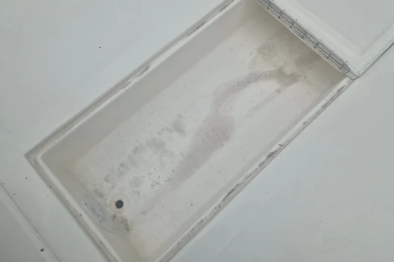 Slide: The Image of Clean storage compartment of 2027 Arima Sea Ranger 21 Yellowtail Edition boat. - 11