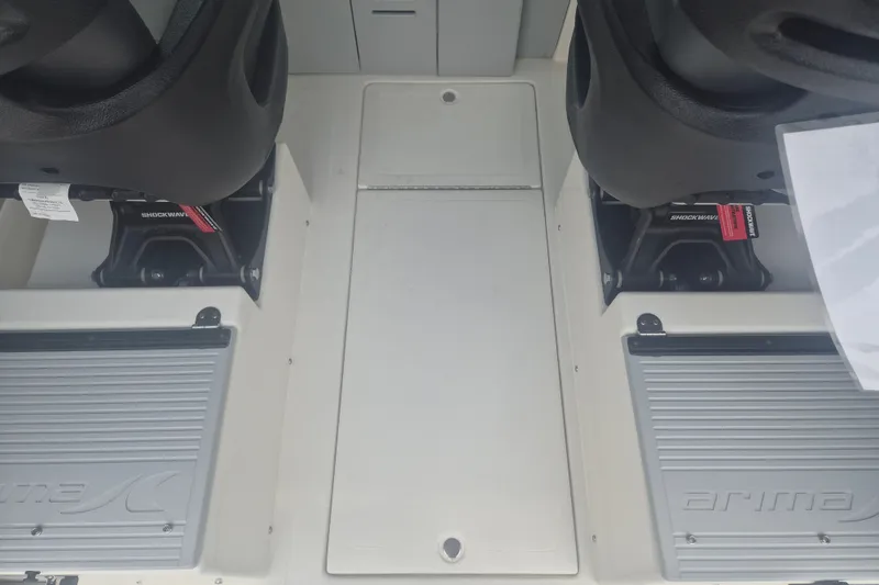 Slide: The Image of Interior view of 2027 Arima Sea Ranger 21 Yellowtail Edition boat seating area. - 21