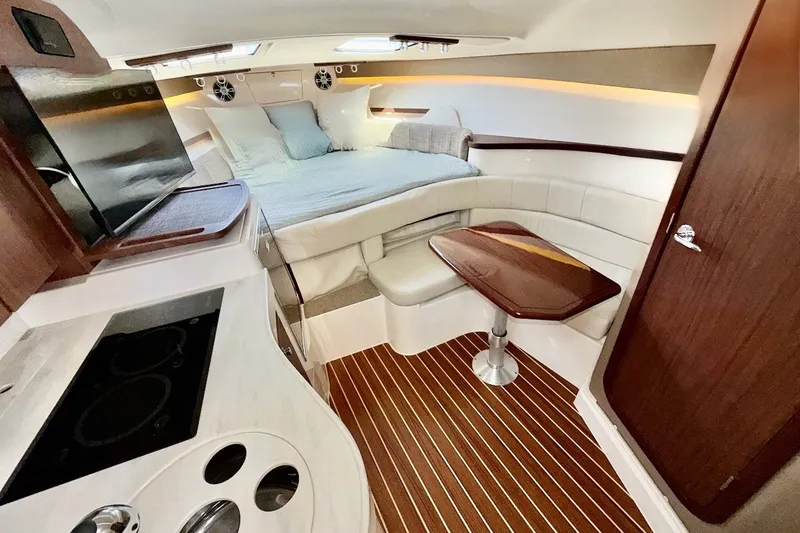 Slide: The Image of Luxurious interior of 2023 Grady-White Express 330 boat with cozy seating and modern amenities. - 5