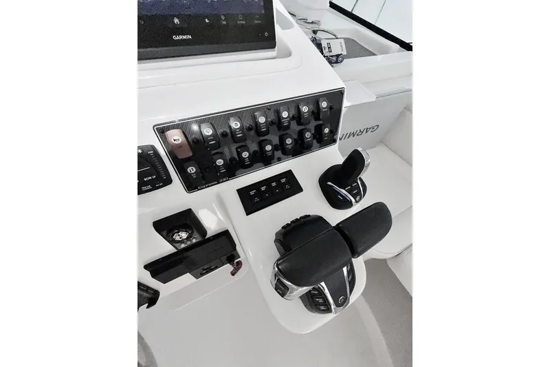 Slide: The Image of Control panel of 2023 Grady-White Express 330 boat with Garmin electronics. - 17