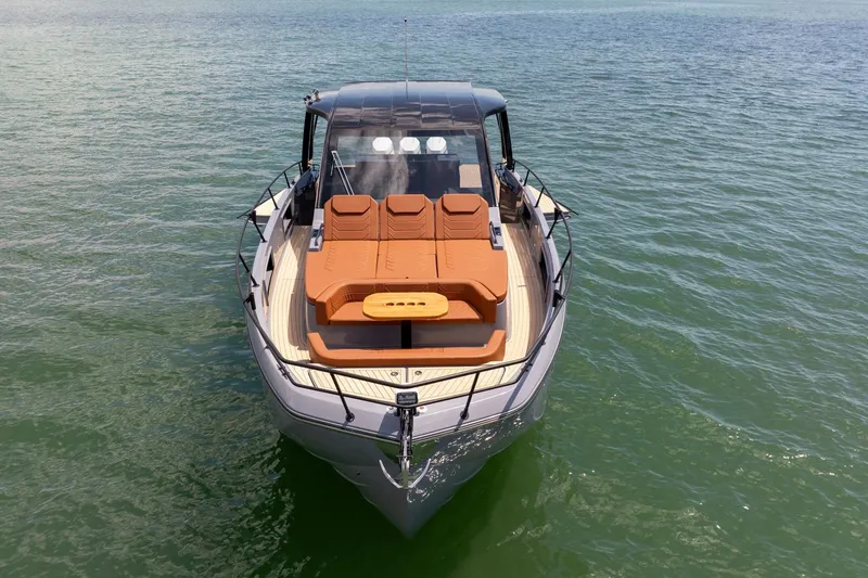 Slide: The Image of Luxury Hanover 447 yacht, 2026 model, with sunbathing deck on calm waters. - 4