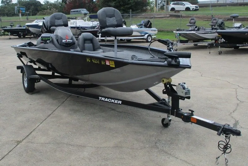 Slide: The Image of 2019 Tracker Pro Team 175 TXW fishing boat on trailer in parking lot. - 3