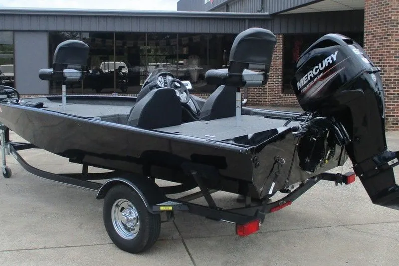 Slide: The Image of 2019 Tracker Pro Team 175 TXW boat with Mercury outboard motor on trailer. - 4