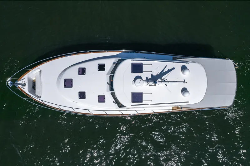Slide: The Image of Overhead view of 2021 Palm Beach Motor Yachts PB55 on water. - 47