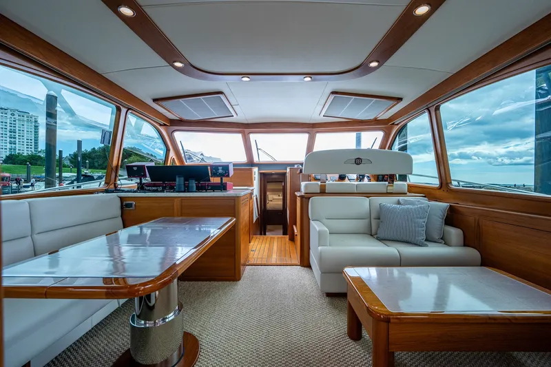 Slide: The Image of Luxurious interior of 2021 Palm Beach Motor Yachts PB55 with elegant wood and leather finishes. - 15