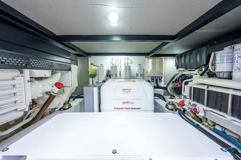 Slide: The Image of Engine room of 2021 Palm Beach Motor Yachts PB55 with Fischer Panda generator. - 43