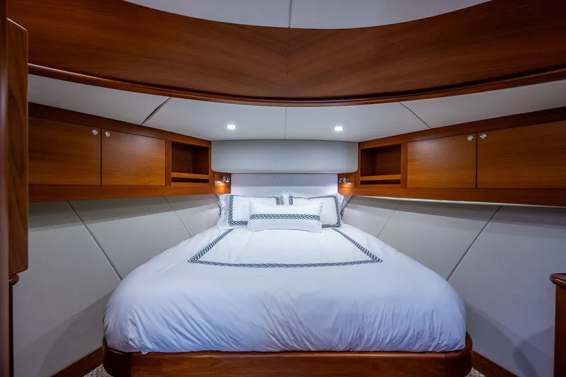 Slide: The Image of Luxurious cabin interior of 2021 Palm Beach Motor Yachts PB55 with elegant wood finish. - 28