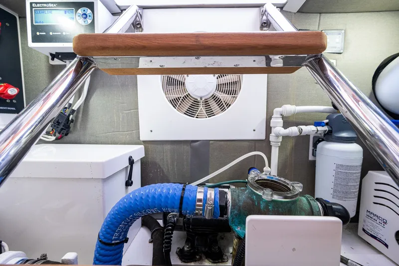 Slide: The Image of Engine room of 2021 Palm Beach Motor Yachts PB55 with marine equipment and ventilation. - 39