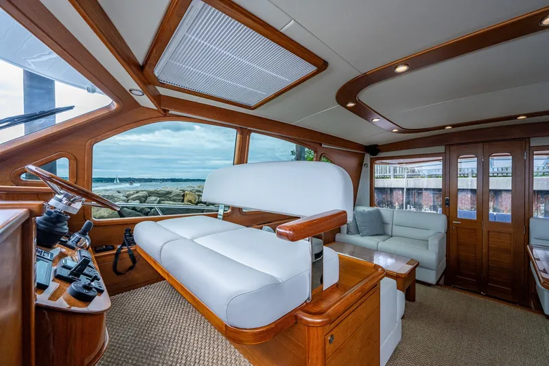 Slide: The Image of Luxurious interior of 2021 Palm Beach Motor Yachts PB55 with elegant wood and leather finishes. - 21
