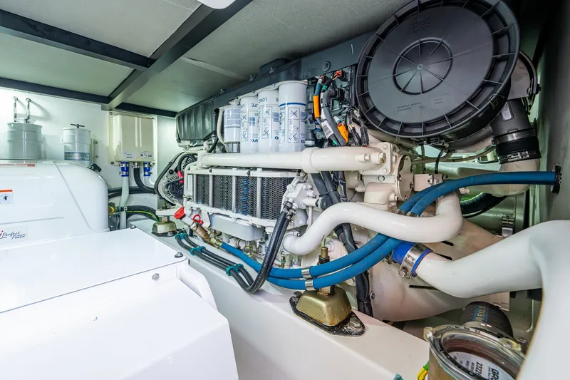 Slide: The Image of Engine room of 2021 Palm Beach Motor Yachts PB55, showcasing advanced mechanical components. - 41