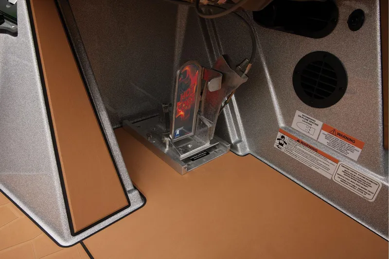 Slide: The Image of Manufacturer Provided Image: Interior view of 2026 Ranger Z520R Ultra boat with safety warnings and foot pedal. - 42