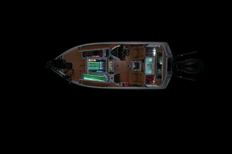 Slide: The Image of Manufacturer Provided Image: Overhead view of 2026 Ranger Z520R Ultra boat interior with illuminated compartments. - 11