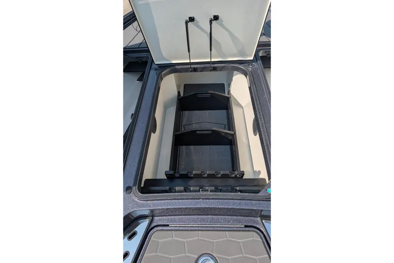 Slide: The Image of Open storage compartment of 2026 Ranger Z520R Ultra boat, showcasing interior design. - 9