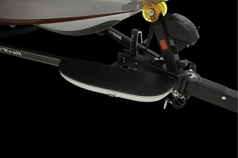 Slide: The Image of Manufacturer Provided Image: 2026 Ranger Z520R Ultra boat trailer hitch and step detail on black background. - 75