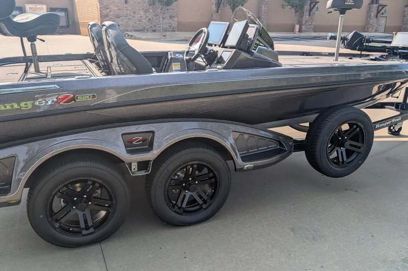 Slide: The Image of 2026 Ranger Z520R Ultra boat on trailer, featuring sleek design and modern equipment. - 3