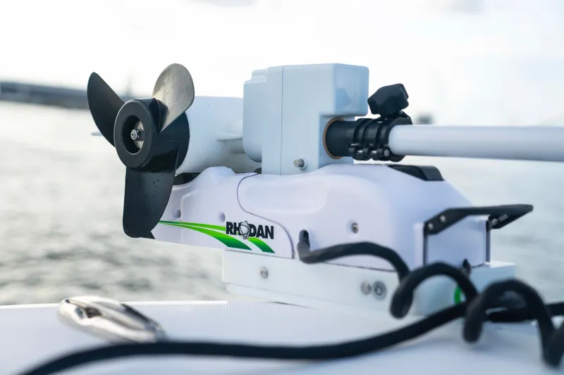 Slide: The Image of Rhodan trolling motor on 2025 Front Runner 36 Center Console boat, close-up view. - 19