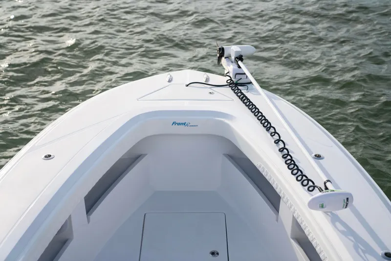 Slide: The Image of 2025 Front Runner 36 Center Console boat on water, showcasing sleek design and advanced features. - 18