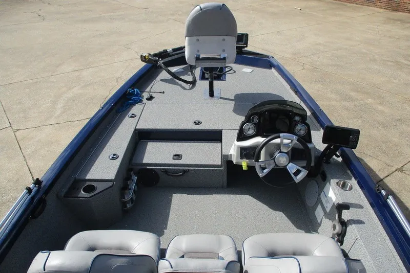 Slide: The Image of 2018 G3 Sportsman 17 boat interior with steering wheel and seating. - 3