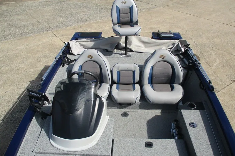 Slide: The Image of 2018 G3 Sportsman 17 boat interior with seating and Garmin equipment. - 7