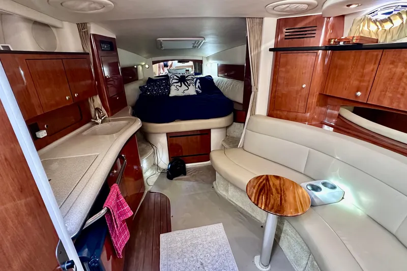 Slide: The Image of Luxurious interior of a 2007 Sea Ray Sundancer 320 yacht with elegant wood finishes. - 15