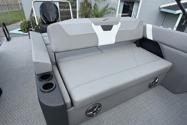 Slide: The Image of Luxurious seating on 2027 Evotti 523CS boat with cup holders and modern design. - 15