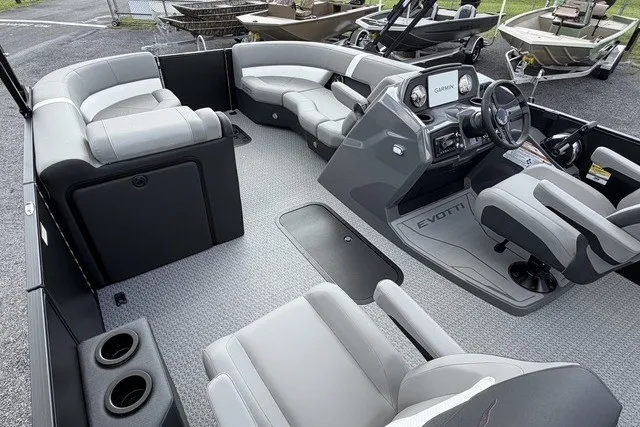 Slide: The Image of Interior of a 2027 Evotti 523CS boat with modern seating and steering console. - 21