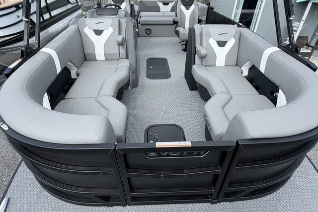Slide: The Image of Luxurious 2027 Evotti 523CS pontoon boat with spacious seating and modern design. - 13