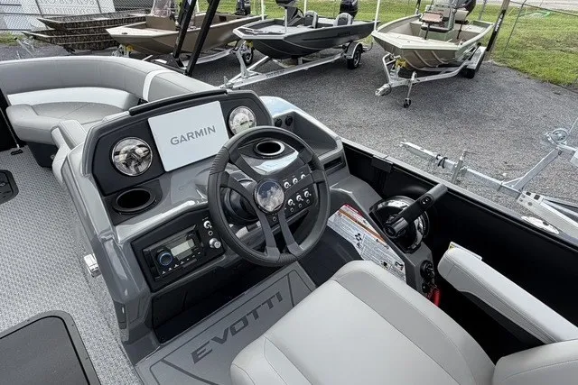 Slide: The Image of Cockpit of 2027 Evotti 523CS boat with Garmin navigation system and modern controls. - 20