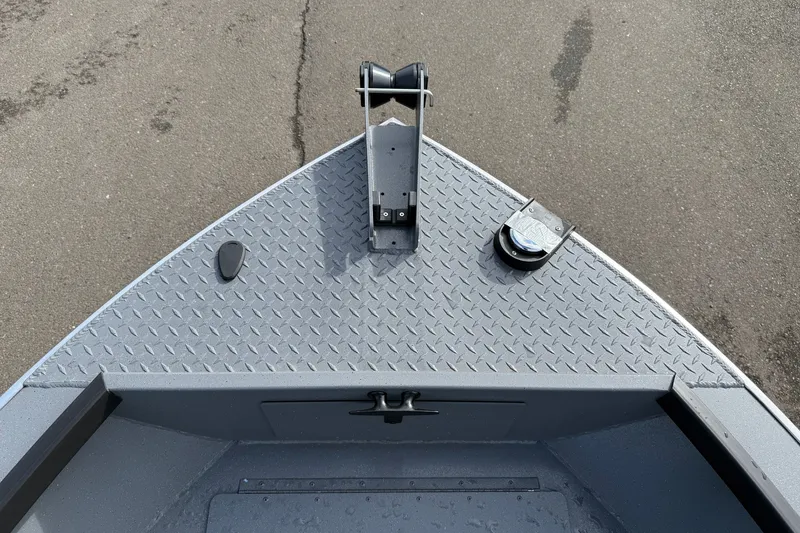 Slide: The Image of Bow of 2027 Alumaweld Free Drifter 18 boat with diamond plate deck. - 6
