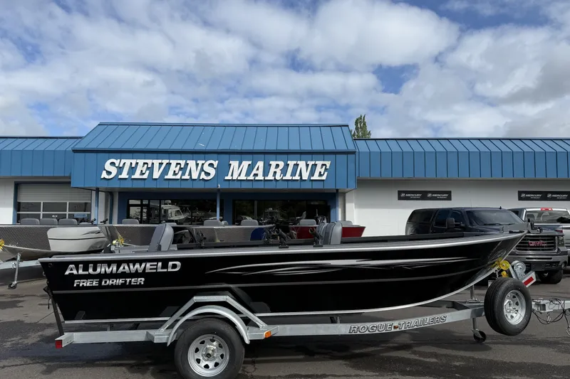 The Image of 2027 Alumaweld Free Drifter 18 boat on trailer at Stevens Marine dealership. - 1