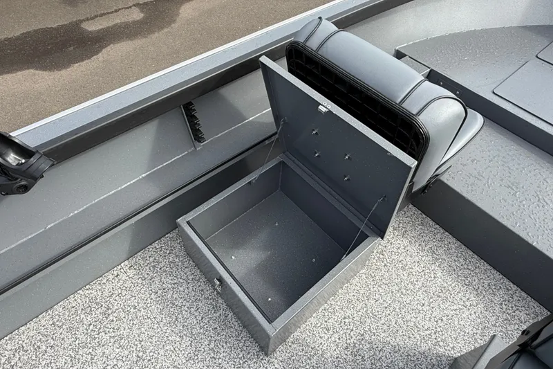 Slide: The Image of 2027 Alumaweld Free Drifter 18 boat interior with open storage compartment. - 17