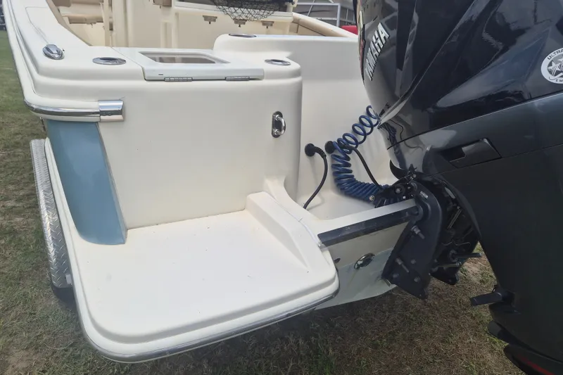 Slide: The Image of 2017 Scout 215 XSF boat with Yamaha outboard motor, rear view. - 4