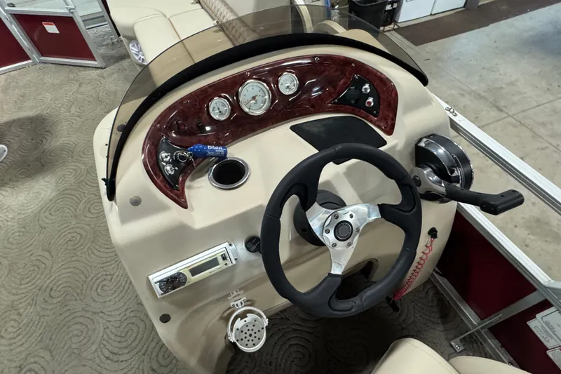 Slide: The Image of Steering console of 2014 Sun Tracker Party Barge 20 DLX pontoon boat. - 16