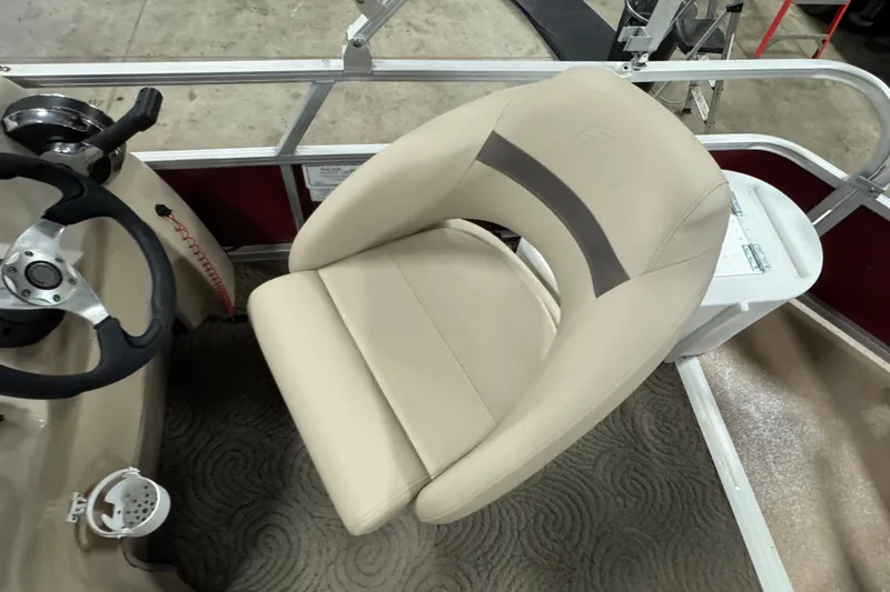 Slide: The Image of Captain's seat and steering wheel of a 2014 Sun Tracker Party Barge 20 DLX pontoon boat. - 8