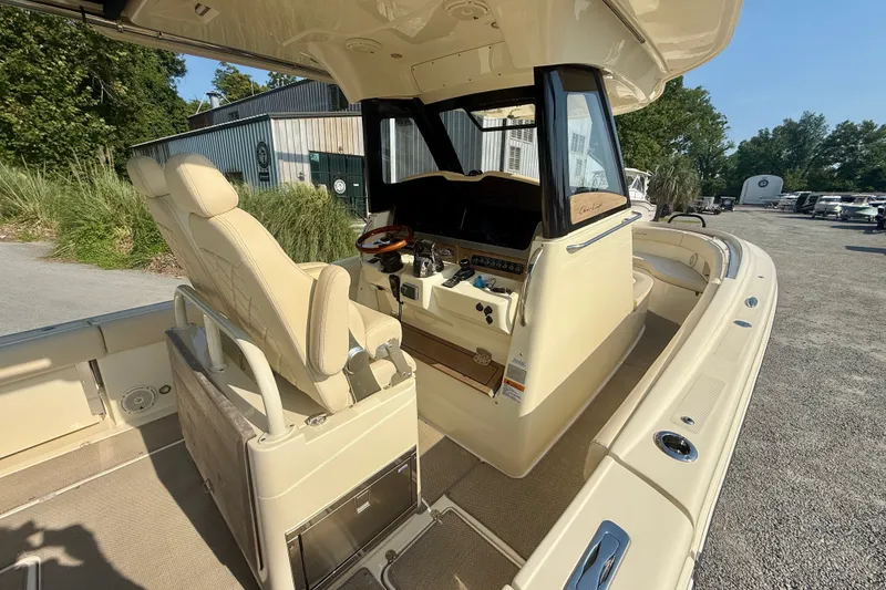 Slide: The Image of 2019 Chris-Craft Catalina 30 boat interior with helm and seating area. - 20