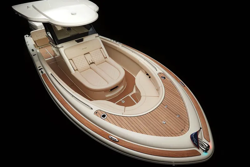 Slide: The Image of Manufacturer Provided Image: 2019 Chris-Craft Catalina 30 boat with luxurious seating and wooden deck. - 7