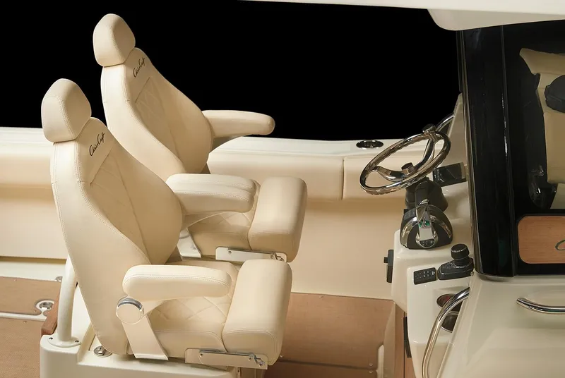 Slide: The Image of Manufacturer Provided Image: 2019 Chris-Craft Catalina 30 helm seats and steering wheel. - 10
