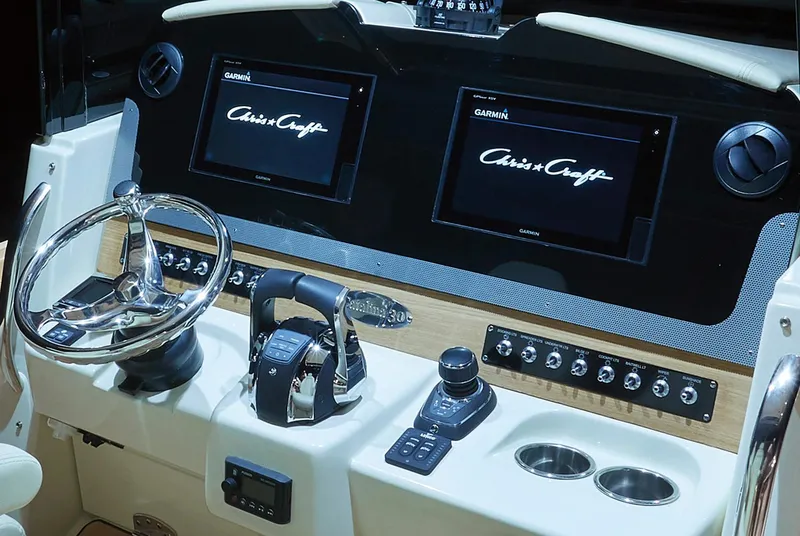 Slide: The Image of Manufacturer Provided Image: 2019 Chris-Craft Catalina 30 helm with dual Garmin displays and modern controls. - 9