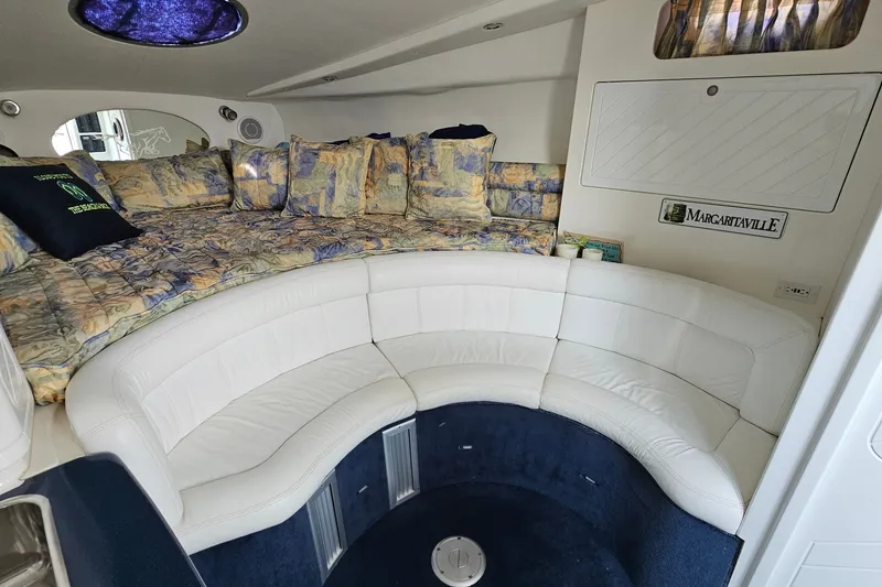 Slide: The Image of Interior of 2001 Mustang 3200 Sport Cruiser with plush seating and cozy bedding. - 15