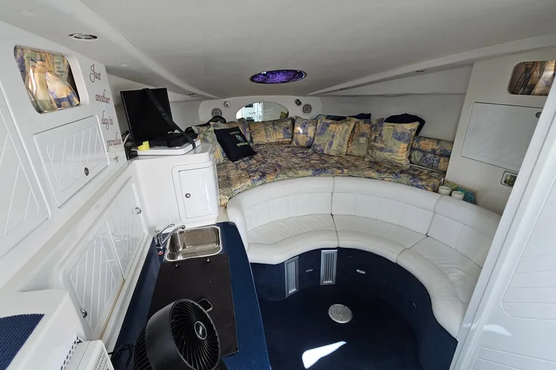 Slide: The Image of Luxurious interior of a 2001 Mustang 3200 Sport Cruiser with plush seating and modern amenities. - 14